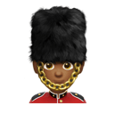 man guard: medium-dark skin tone appearance on Apple