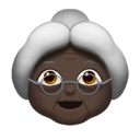 old woman: dark skin tone appearance on Apple
