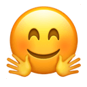 smiling face with open hands appearance on Apple